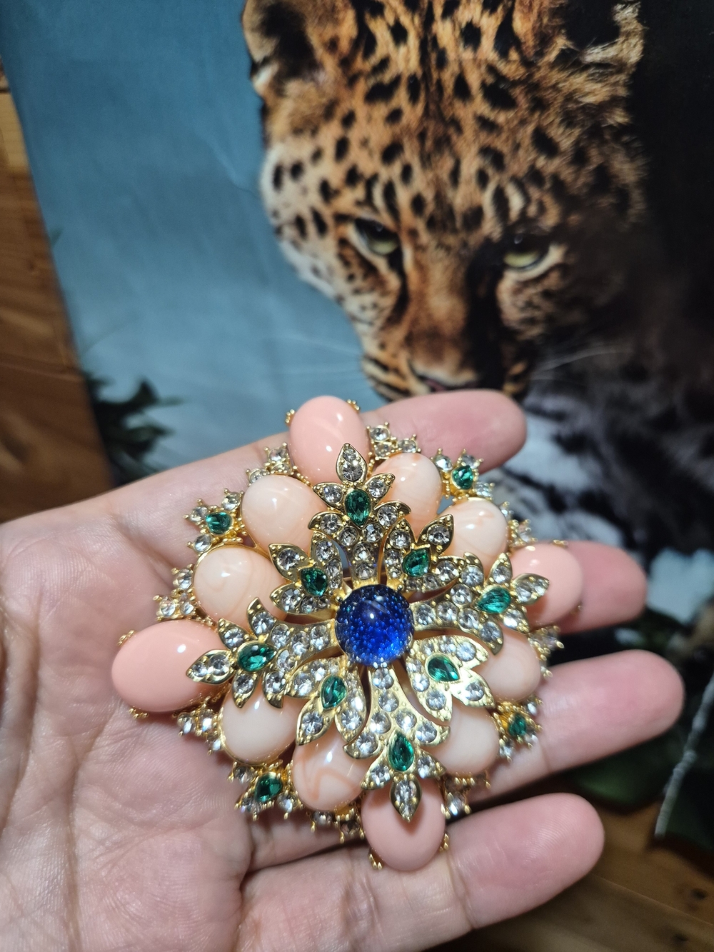 Gold-Tone Floral Brooch with Pink Petals, Green Accents & Blue Center